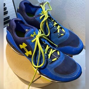 Men’s size 10 1/2 Under Amour Bright Blue and Bright yellow athletic shoes.